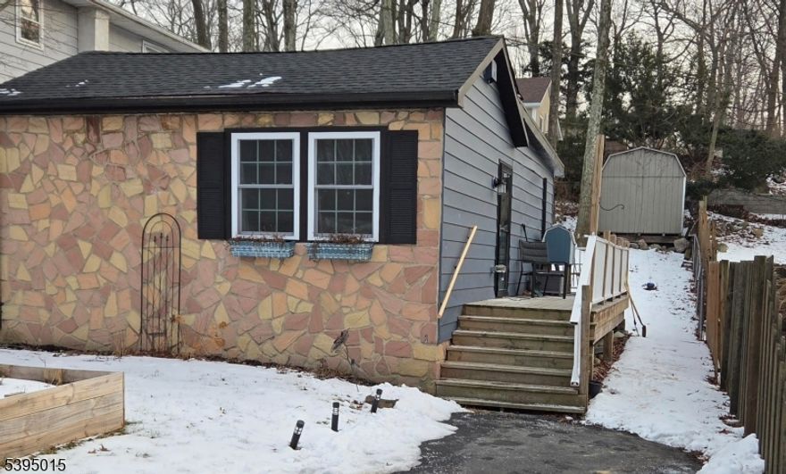 Charming ranch home on quiet street. Everything redone in 2022. New well pump, windows, doors, flooring, backsplash, mini-split heat system with central AC, cabinets, fixtures, roof, electrical panel, stove, dishwasher, washer/dryer hookup, hot water heater. City sewer. Not septic.