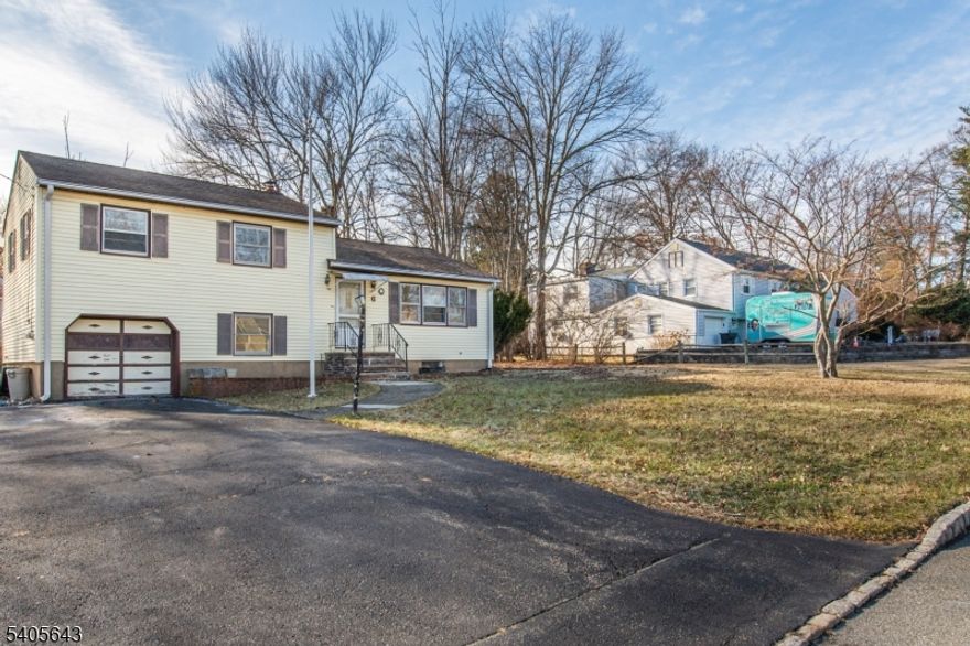 Set in a sought after neighborhood, this split-level home is positioned on an expansive lot exceeding one third of an acre, offering space, privacy, and exceptional long-term potential. The generous property size and tranquil surroundings create an ideal foundation for buyers looking to invest in a home they can personalize and grow into over time.The interior offers three bedrooms, one full bath, and a ground-level family room that provides flexible space for everyday living, entertaining, or future redesign. A full unfinished basement presents endless possibilities for additional living space, a home office, recreation room, or abundant storage. With the right vision, there is opportunity to expand the home's footprint, add another bathroom, and create a deck for seamless transition from inside to outdoor living.Located within a prime school district and benefiting from very low property taxes, this home also offers convenient access to major highways, making commuting and daily travel effortless. Whether your goal is customization, expansion, or reimagining the space, this property delivers the location, lot size, and versatility to bring your vision to life. Property is being sold completely AS-IS. No credits or repairs will be considered.