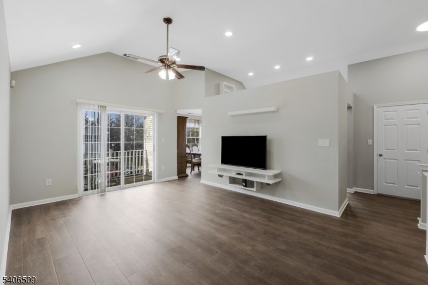 This Stratton Meadow 2 bedroom, 2 bath condo end unit is ready for the most discriminating tenants. Newly updated with Plank flooring, high hat lights throughout, freshly painted throughout, all new kitchen and laundry appliances. The open floor plan feels very spacious with the vaulted ceiling and sliding glass doors to deck bringing in an abundance of light. Separate dining room can be left furnished, main bedroom has large walk in closet and pull down attic stairs for attic storage. Private location facing woods.