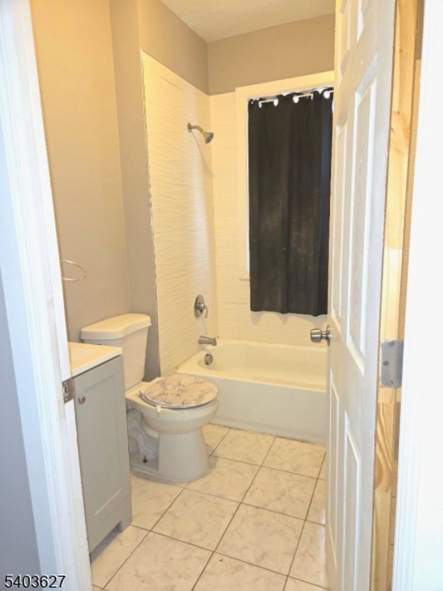 Turnkey Investment Property in Prime East Orange Location.Located in East Orange, this fully rented multi-family home offers excellent access to transportation, including trains to NYC, local bus routes, and connections to Newark Penn Station, NJPAC, and more. All apartments were tastefully updated in 2025, featuring spacious kitchens with sleek granite countertops, modern backsplashes, and abundant cabinetry. Hardwood floors run throughout each unit, and all bathrooms have been fully renovated. The second-floor unit also includes a private balcony for added appeal.Current Rental Breakdown:1st Floor: 3 bedrooms, living room   $2,150, lease expires December 2026 2nd Floor: 3 bedrooms, living room, balcony   $2,400, lease expires October 2026 3rd Floor: 2 bedrooms, living room   $1,650, lease expires April 2026 with strong rental income, updated interiors, and long-term tenants in place, this is a true turnkey investment opportunity in a high-demand area.