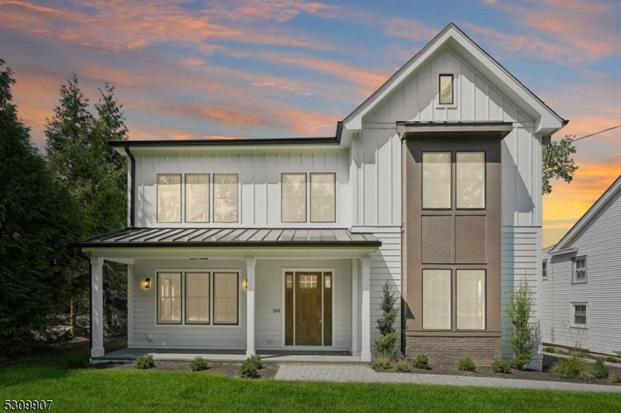 Discover luxury in this newly built masterpiece in Madison. With 6 bedrooms and 6.1 bathrooms, this home combines convenience and elegance, a short distance from top schools and vibrant downtown. Designed by architect Thomas Baio and built by Geiss Custom Builders, the home features a grand foyer, high ceilings, custom beams, and a handsome living room with a gas fireplace. A first-floor guest suite and a practical mudroom enhance daily living. The gourmet kitchen boasts custom cabinetry, Jen-Air appliances, quartz countertops, and a wet bar, seamlessly connecting to a formal dining room. The second floor is a retreat, featuring a luxurious primary suite with oversized custom walk-in closets, a spa-like bath, and a ventless fireplace, plus three additional spacious bedrooms, each with its own en-suite bathroom. The third level offers versatile space for a home office or gym, while the finished basement includes an extra bedroom and a recreation room. This home perfectly blends timeless design with modern convenience in a prime location. Seize the opportunity to make it yours.