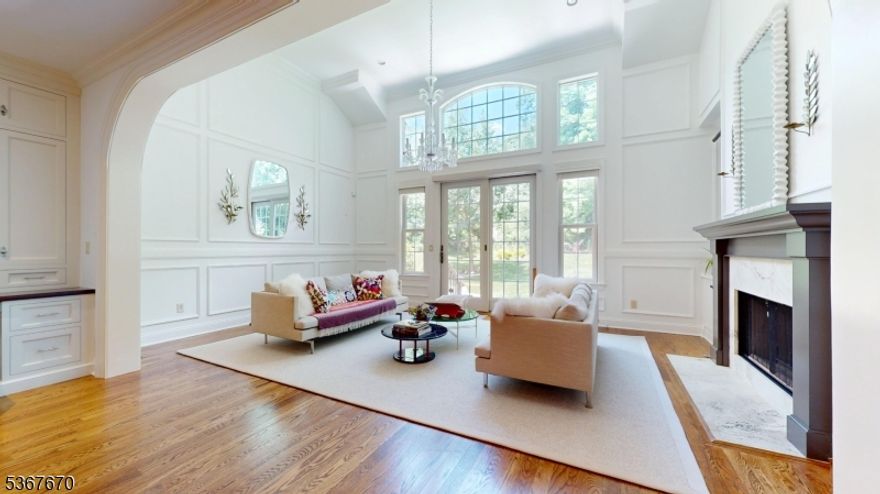 This exquisitely redesigned townhome blends timeless elegance with modern luxury. Nestled against a private wooded backdrop, it features a custom gourmet kitchen with marble countertops, and top-of-the-line appliances. The sun-drenched two-story family room centers around a striking fireplace, while the first-floor primary suite offers a spa-inspired bath and custom California Closets walk-in. Upstairs, a spacious loft accompanies two additional bedrooms with walk-in closets. The finished lower level impresses with a custom wet bar, recreation room, office/guest suite, full bath, and abundant storage. Designer-selected tile, marble, and wall coverings elevate every space. Amenities are club house, exercise room, and outdoor pool. HOA is $1100/month.