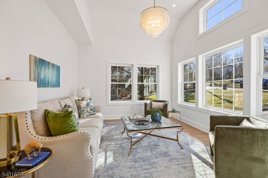 49 The Fellsway - an exquisite new construction home built w/care & precision by the highly respected Lefko Brothers, renowned family owned builders w/a reputation for perfection - charming front porch greets you - enter into a large foyer flanked by formal living room & dining room w/plenty of space for your next dinner party - pinterest worthy butler's pantry w/wine fridge - private first floor guest suite for out of town visitors - kitchen is a chefs masterpiece - extra large 4 stool center island is the heart of this home - high-end appliances - bertozzoni gas range - gorgeous range hood - custom cabinetry - premium finishes - bespoke hardware - detailed millwork & wood flooring throughout - spacious light filled family room w/gas fireplace create a warm & inviting space for relaxing evenings - upstairs are 3 large sunny bedrooms - spa like hall bath & ensuite bath - large closet space - convenient second floor laundry room w/sink - elegant primary suite has soaring ceiling w/custom millwork & luxury lighting - large spa like bathroom w/dual sink vanity & wet room soaking tub & oversize shower - spacious walk in closet - lower level finished walk out basement is functional & adds tremendous living space to the home - convenient mud room near entry door - plentiful space in recreation room for games, play space or homework - bedroom and full luxury bath - New Providence is a quick train ride to NYC with highly rated schools and lovely downtown area - Welcome Home!