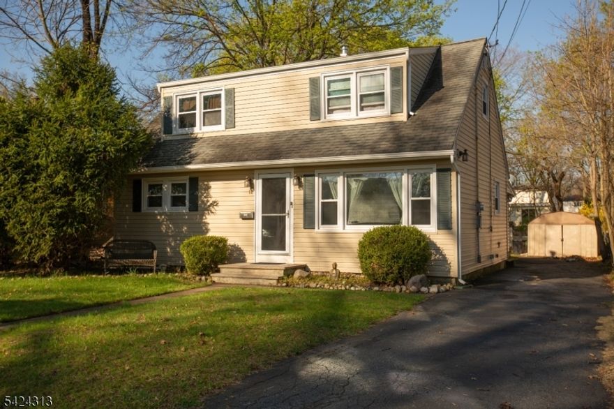 This charming Cape Cod is situated on a quiet street in a welcoming neighborhood. Home features 3 spacious bedrooms, 1 full bathroom, dining room, laundry/utility room and both living and family rooms. Thoughtful updates include bamboo flooring in portions of the home. Convenient access to schools, parks, shopping, and dining. Great location for NYC commuters! Property also features an extra half lot, offering expanded backyard area. Enjoy the convenience of natural gas and public water/sewer. Central A/C and furnace - 5 yrs old. Chimney liner, dishwasher and refrigerator - 1 yr old.