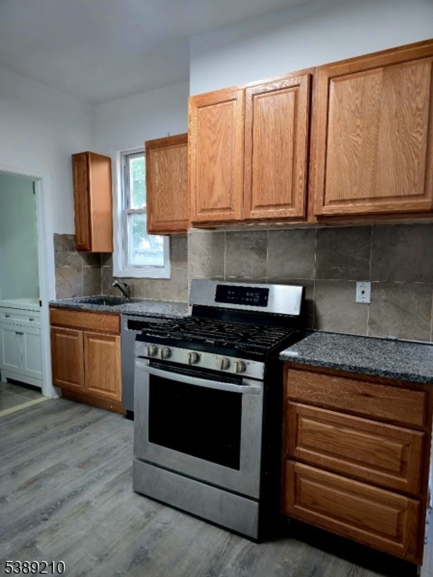 Newly renovated bright, spacious, and sunny 3 bedroom and 1 full bath available now.  Apartment features high end backsplash and countertops, stainless steel appliances (5 burner stove and a dishwasher).  Space includes mini split air units for comfort in each room, large closets, large living room with built in bookcase.  There is also a relaxing and private outdoor space and there is laundry on premises. This unit can be found in the residential area of Weequahic near major transportation hubs making commuting a breeze.  It is also near major hospitals, highways, restaurants and parks.