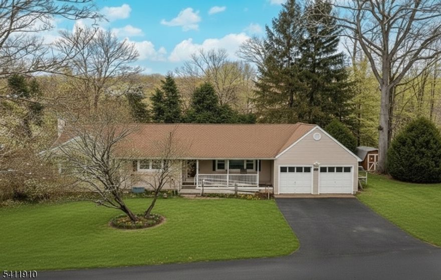 Welcome to this beautifully updated ranch home that perfectly blends comfort, style, and accessibility. Thoughtfully designed with an accessible ramp, this home offers easy single-level living in a desirable Byram Township with an unbeatable commute. Step into a bright open-concept featuring a new kitchen (2020) with modern finishes including granite counter tops, custom cabinetry with crown moulding, and stainless steel appliances. The beautiful kitchen seamlessly flows into the main living space featuring a cozy wood burning fireplace. The home features updated bathrooms (2020), HVAC (2024) and hardwood flooring throughout (2020). Three bedrooms including a primary suite with stall shower.The interior has been professionally painted giving it a fresh, move-in-ready feel.The sunroom/laundry room opens to the spacious deck and paver patio, ideal for entertaining. An oversized two-car garage provides ample space for vehicles and storage. Full attic and full basement also provides additional storage. Close to shopping, hiking trails, and fishing on the Musconetcong river. With easy access to Route 80, this home is a commuter's dream while still offering a peaceful residential setting. A real gem!