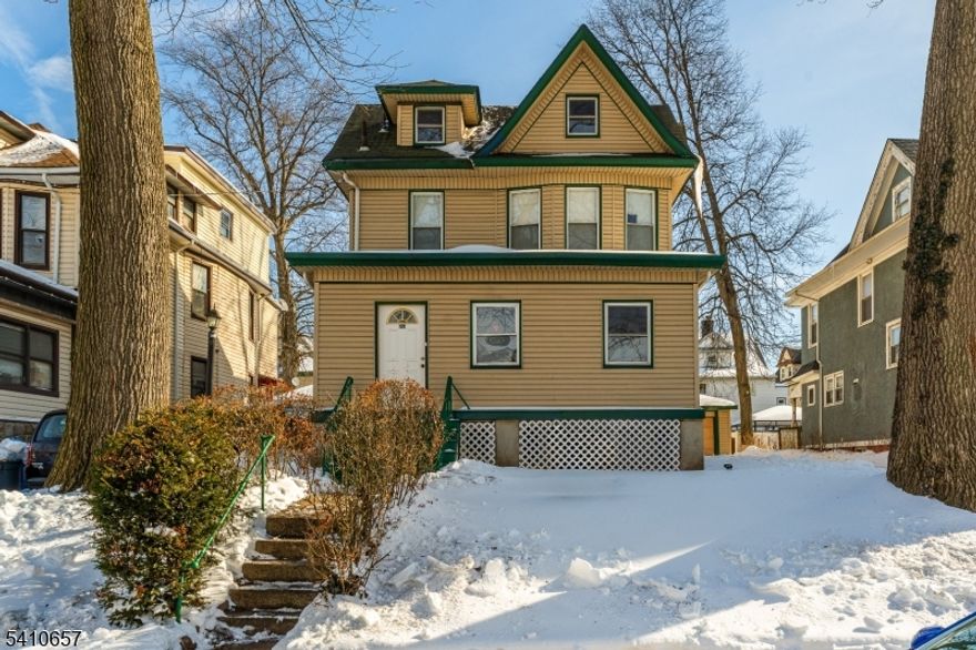 Step into the charm of this classic Colonial nestled in the sought-after Forest Hills section of Newark. Offering 3 bedrooms, 2 full baths, and a convenient half bath, this home is full of character and potential. Original details and a traditional layout provide the perfect canvas for renovation and customization. Whether you're an investor searching for your next project or a homeowner eager to restore and personalize a timeless property, this home is a rare opportunity. With some TLC, this Colonial can truly shine. Located near parks, transportation, and local amenities don't miss the chance to bring new life to this Forest Hills gem. (Decommissioned oil tank underground)