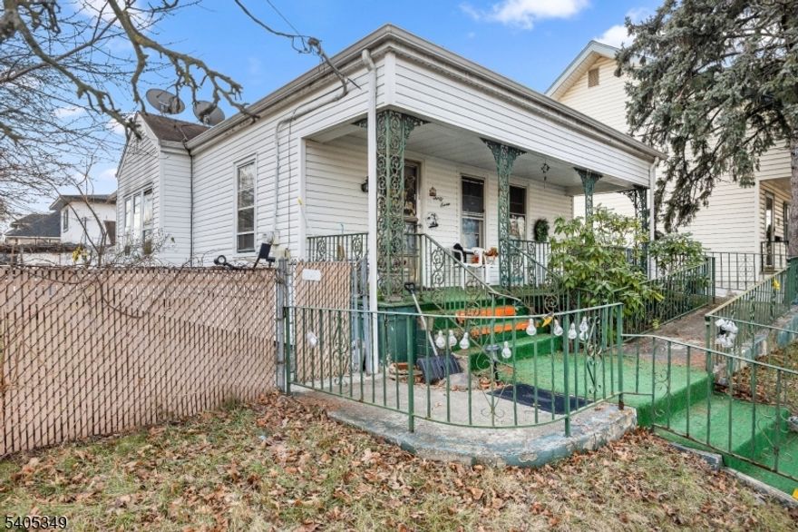 Situated on a corner lot in Linden, this single family home offers space, flexibility, and excellent location convenience. The property features 2 bedrooms and 2 full bathrooms, along with a finished basement that provides additional living or recreational space.The exterior includes a 2 car garage, 2 car driveway, and both a side yard and backyard, offering plenty of room for parking, storage, and outdoor enjoyment.Ideally located with NYC transportation just steps away, and close to shopping, stores, and restaurants, this home offers easy access to everyday conveniences and commuting options. Great opportunity in a well-connected Linden neighborhood.