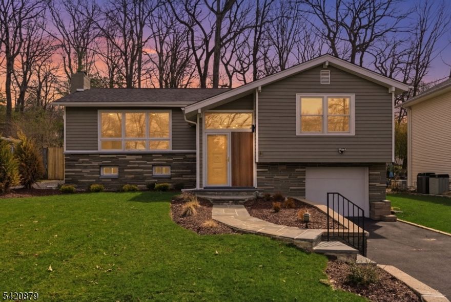 This stunning home in White Meadow Lake, Rockaway, offers a perfect blend of modern style and everyday comfort. Featuring a brand-new kitchen and beautifully updated bathrooms, the home is enhanced by stainless steel appliances, hardwood flooring on the upper level, and luxury vinyl flooring throughout the lower level.Nearly all windows have been replaced, allowing for abundant natural light. Additional upgrades include a new roof, gutters, and a new AC system for peace of mind.The exterior has been fully refreshed with a new driveway and professionally landscaped yard with lush sod, creating fantastic curb appeal. Inside, you'll find new interior doors accented with sleek black hardware, recessed lighting, and updated railings that elevate the overall design.The lower level also offers an additional room that could be converted into a full bathroom, providing flexibility for future expansion or customization.The heated garage adds year-round convenience, making this home as functional as it is beautiful. Enjoy all the lifestyle benefits that White Meadow Lake has to offer while living in a truly move-in-ready home with high-end finishes throughout nothing to do but unpack!Lake privileges with year-round activities. Boating, 2 pools, beaches, fishing, pickleball, and more. Close to all major highways, RT 80, RT 46.