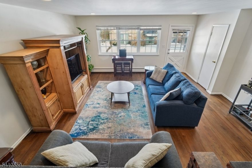 Best of Both worlds! CHARMING and QUIET Parsons Village is a resort oasis with an Inground Pool yet less than a mile from the VERY HIP Morristown Green and NYC mid-town direct TRAIN. This COOL VIBE apartment featuring 2 BD and 2.1 Bath - the only unit of this size on the market in 4 years! UPDATED kitchen features granite countertops, stainless steel appliances, ample cabinetry and is open to Dining area. COZY Sunken Living Room with a walk-out to a NEW patio is perfect for entertaining. Upper Levels includes the Primary Bedroom with an En-Suite Bath, and a few steps away a 2nd nice-size Bedroom with another FULL Renovated Bath in 2024. The finished basement, redone in July 2022, includes a Recreation Room, laundry area, and storage space. Additional updates include redone floors in 2022, patio updated in 2023, newly installed central AC system in 2024, mostly New windows in 2022, and roof replaced in 2025. The location of this unit offers AMPLE PARKING. Move Right in and Enjoy Life!