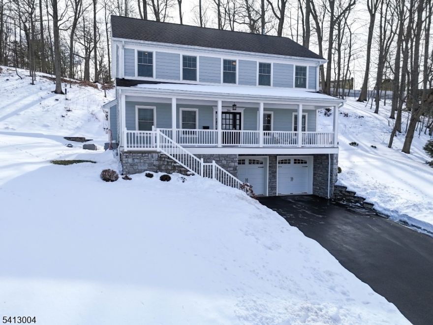 This gorgeous 4 bed, 3.1 bath custom Colonial, built by Gualluisi in 2020, is located on the highly desirable north side of Westfield in the highly sought after Franklin School District. Beautifully designed for both everyday living and effortless entertaining, the gourmet eat-in kitchen with a center island flows seamlessly into the inviting family room featuring a gas fireplace. The first floor also offers a formal dining room, living room, and a convenient laundry room. Gorgeous hardwood floors run throughout the home. The second floor boasts a spacious primary suite complete with a large en-suite bath and walk-in closet, along with three additional bedrooms and a full hall bath. The fully finished lower level includes a mudroom just off the two-car garage, a generous recreation room, ample storage space, and an additional full bath. Step outside to the beautifully redesigned patio, perfect for entertaining and complete with a fire pit and plenty of space to gather. Located just minutes from trains, shopping, and everything downtown Westfield has to offer, this exceptional home is also conveniently situated just 20 miles from NYC.