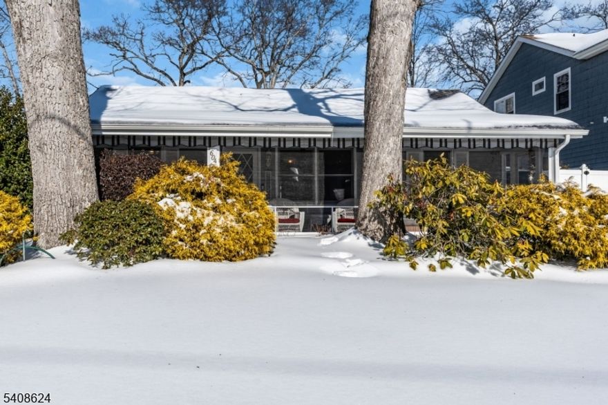 Less than a mile from the beach, this inviting 4-bed, 1 -bath  coastal ranch offers the perfect blend of Jersey Shore charm and everyday comfort. It is located on an oversized lot, east of Route 71, on a desirable neighborhood street providing direct access into Spring Lake, just moments from the Third Avenue shops, restaurants, caf s, boardwalk, and pristine beaches. A charming screened-in front porch welcomes you an ideal spot to enjoy refreshing shore breezes and relaxed moments with friends. Inside, the spacious living room features vaulted ceilings and skylights that flood the space with natural light. The open-concept layout flows effortlessly into the kitchen and dining area, creating a pleasing setting for both everyday living and entertaining. The backyard is a true private retreat. Fully fenced and thoughtfully designed, it features a heated in-ground pool, expansive patio, and bocce ball court perfect for summer gatherings, outdoor fun, or unwinding after a day at the beach. Additional highlights include a long private driveway for ample off-street parking and generous storage. Set among some of Spring Lake's finest multi-million-dollar homes, the property delivers an exceptional setting and strong long-term value. Just a few blocks to the train to NYC. Whether you're seeking a year-round residence or a weekend escape, this home captures the essence of the Jersey Shore lifestyle relaxed, vibrant, and conveniently coastal.