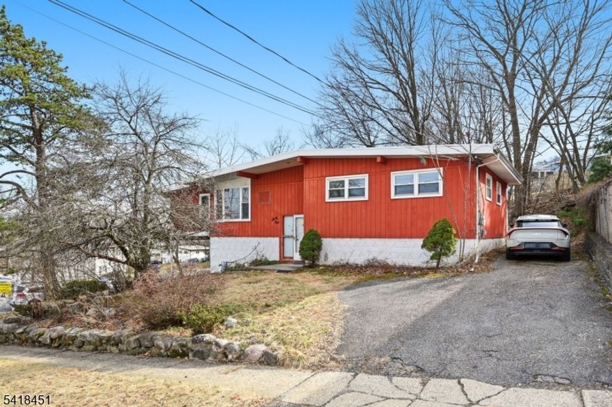 Move right into this beautifully refreshed home tucked away on a quiet street in Rockaway Boro!  The main level features bright, open living and dining spaces, and updated galley kitchen, a brand new hall bath, and three generous bedrooms.  Off the kitchen, the enclosed porch with all new windows fills the room with natural light.  The new finished walkout basement with a full bath, provides versatile extra living space, perfect for a home office, media room, or extra storage area.  Two driveways provide ample parking.  Ideally located near shopping, public transportation, and with an easy commute to NYC this one is not to be missed.