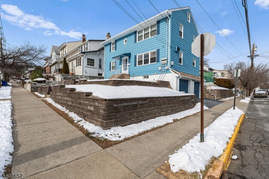 Welcome to this well-maintained two-family home offering comfort, space, and flexibility. Unit 1 features two bedrooms, one full bath, an eat-in kitchen, and a bright living room. The finished basement provides additional living space and includes laundry, along with access to a convenient two-car garage. Unit 2 offers two bedrooms, one full bath, an eat-in kitchen, and a cozy living room, plus an unfinished walk-up attic ideal for storage or future possibilities. Enjoy a spacious yard with a mix of asphalt and grassy areas, perfect for outdoor use. The home is in great condition with updated kitchen counters and is truly move-in ready. An excellent opportunity for owner-occupants or those seeking additional living space.