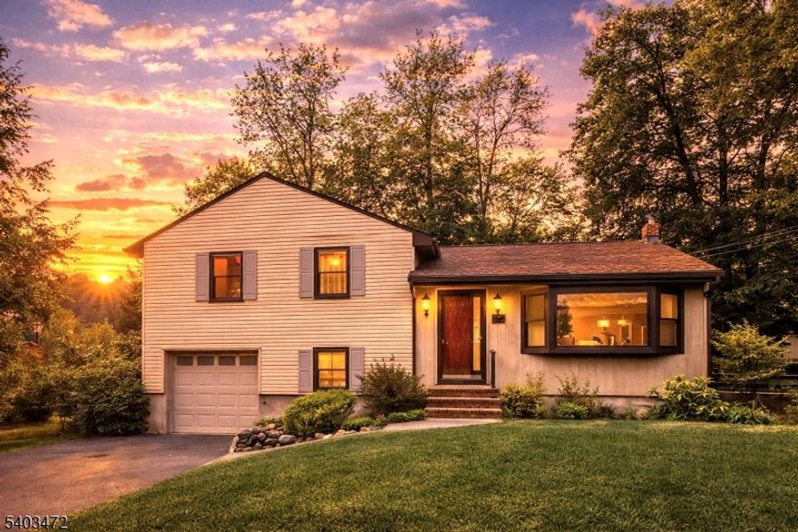 Well-located split-level residence in desirable Ho-Ho-Kus, offering a practical and comfortable layout ideal for everyday living. The main level features a light-filled living room, dining area, and kitchen with easy flow for gatherings. Upstairs includes three bedrooms and a full bath, along with a private half bath off the primary bedroom. The lower level offers a den/family room, laundry area, and direct entry from the attached garage, plus additional finished basement space suitable for storage or a home office. Set on a generously sized lot with yard use, this home is close to schools, shopping, parks, and transportation an excellent opportunity in a highly regarded community.