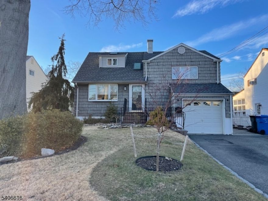 Impeccable tri-level split level in desirable Chain O Hills location, convenient to NY train, schools, shopping, parks etc.  This beautiful move-in home has been recently renovated:  kitchen, baths, gas furnace, hth, deck, freshly painted and so much more.  This bright and light property consists of a spacious eat-in-kitchen/dining room, living room, 3 bedrooms, 2 full baths, spacious family room, lots of closet space and an unfinished basement.  Among some of the features include central air, sprinkler system, gleaming hard wood floors, sliders from dining room to very large two-tier deck, double driveway, access to garage from inside of home, fenced in backyard, professionally landscaped to name a few.  Your buyers are going to love this home.  Very easy to show.