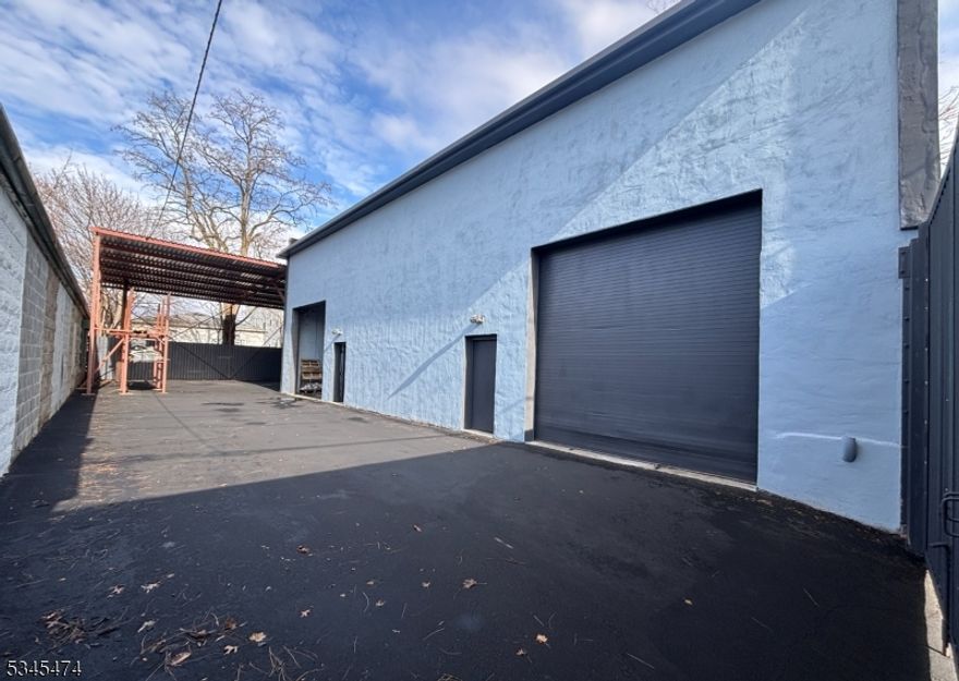 Your opportunity to bring your business into this 2200 square foot building with two separate units broken into equal size at approx. 1,100 square feet each. Structure has 22 foot high ceilings and two 12 foot high bay doors. The bonus of this property is the additional exterior storage and parking for approximately 10 cars underneath a strongly built canopy at back of property. This building is zoned for light industrial use and is currently be utilized as a stone and granite storage and show room. The potential is there for work shop, mechanic and/or an owner occupied user with a vision for expansion. Located near Newark Airport, Garden State Parkway and major highways this is a great property to meet a business owners needs. Seller willing to provide financing.