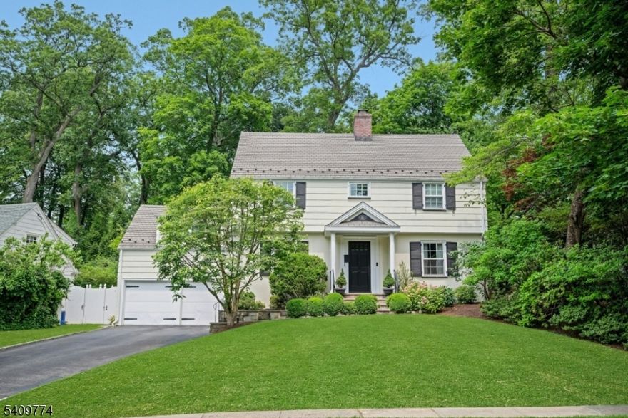 Welcome to 49 Norwood Avenue, a beautifully maintained colonial offering space, flexibility, and an exceptional Summit location. The heart of the home is the bright, spacious kitchen featuring a center island and professional-grade appliances, seamlessly open to the family room with custom built-ins. Designed for everyday living and effortless entertaining, this inviting space flows directly to a bluestone patio and private, flat backyard - the perfect setting for play, gatherings, gardening, or simply relaxing outdoors. Gracious formal living and dining rooms add timeless charm, while abundant natural light and thoughtful updates throughout make the home feel warm and move-in ready. The second floor offers four spacious bedrooms, along with a fifth bedroom, privately accessed by back stairs and complete with its own full bath, ideal for guests or a comfortable in-law suite. The primary suite features a vaulted ceiling, a generous walk-in closet, and a recently renovated bath. The laundry room is also located on the second floor. Around the corner from Lincoln-Hubbard Elementary and ideally located near all of Summit's top-rated schools, vibrant downtown and New Jersey Transit Station (.5 mile away), this home offers both convenience and a true neighborhood feel. 49 Norwood Avenue delivers the layout, outdoor space, and location today's buyers are seeking all in one of Summit's most desirable neighborhoods.
