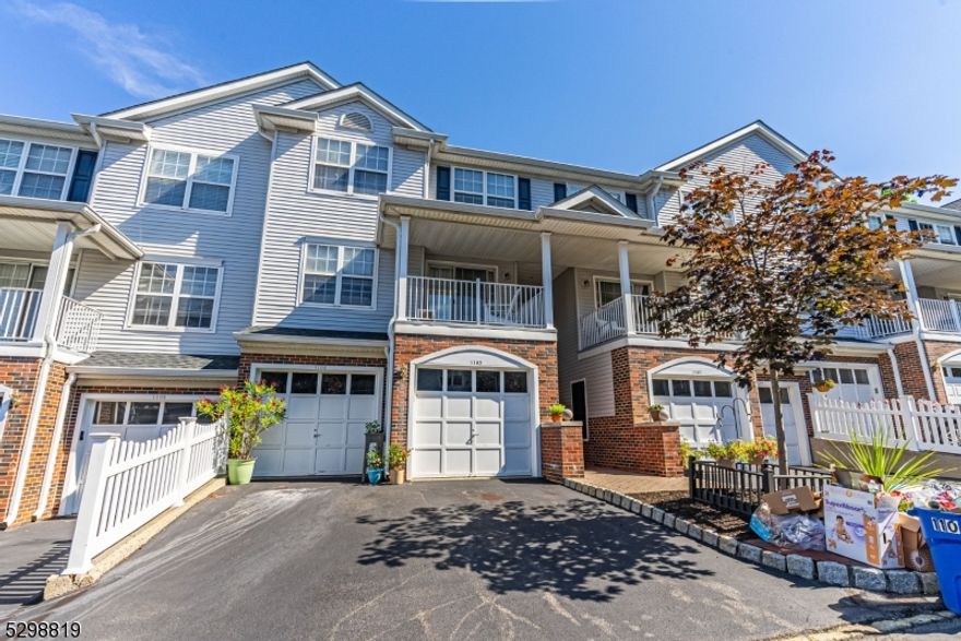 SUPERIOR Newbury MODEL, highly sought after in desirable Berkshire Hills! This model rarely comes on the market with both a private back deck and patio! Pride-of-Ownership is evident throughout this 2 bdrm/2.5bath unit. Ideal Layout. 2 Story Foyer with gorgeous hardwood flooring throughout. Super bright, open yet cozy floor plan. Formal LR w/Gas Fireplace opens to Dining. Updated kitchen offers granite countertops, stainless steel appliances (brand new oven & fridge) and a convenient breakfast bar. BONUS FR in the walkout basement provides so much extra living & versatility. Upstairs hosts 2 bdrms - primary with ensuite, high vaulted ceilings & walk in closet. Second bedroom & a second full bath complete this floor. Exclusive parking plus addtl visitor spots. 1 Car Garage w/smart (myQ) opener & EV charger. Beautifully maintained community with in-ground pool & playground, close proximity to NYC Train/Bus, Major Hwys, Downtown Denville, Morristown Green, shopping & top-rated schools. Many new windows, slider & brand new water heater. This home has a lot to offer!