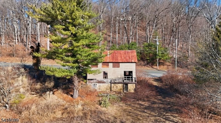 A one-of-a-kind opportunity to build your dream in a highly desirable area with beautiful views of the valley and brook. Surrounded by many local farms and close to Chester, where you will find shopping and dining. Outdoor recreation is nearby, including Schooley Mountain Park, hiking and biking trails, and convenient access to the Peapack"Gladstone and Hackettstown train stations.......This 2.21-acre lot comes with grandfathered approval for rebuild. A TWO STORY ACCESSORY BARN ON THE PROPERTY OFFERS POTENTIAL TO BE RENOVATED OR REBUILT AS AN ACCESSORY BUILDING. IT IS NOT INTENDED OR PERMITTED TO BE USED AS LIVING QUARTERS....... A three-bedroom septic system was installed and approved in 2012....... Available documents: Engineering reports, including a Topological Survey, Boundary Survey, Wetland Delineation, NJDEP FHA Determination, and Plot Plans, have been completed. Township Variance Approval is solely the buyer's responsibility, and PLEASE DO YOUR DUE DILIGENCE. Don't miss this chance, schedule a viewing today! PLEASE DO NOT ENTER THE PROPERTY WITHOUt A CONFIRMED APPOINTMENT!!