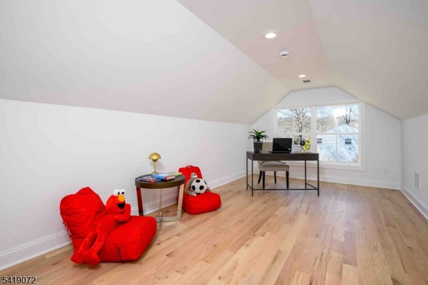 Lovingly renovated and thoughtfully expanded, this 6 BEDROOM 4 BATHROOM home offers the perfect blend of modern luxury and everyday comfort. A fabulous first-floor expansion and primary suite addition elevate the living experience, while a comprehensive upgrade including a NEW roof, siding, windows, 2 unit HVAC, plumbing, electrical, flooring, bathrooms, millwork, and deck provides true turnkey peace of mind.  Designed for both entertaining and daily living, the open-concept layout is flooded with natural light from oversized windows and showcases gleaming hardwood floors and soaring 10-FOOT ceilings. The heart of the home is a massive, dream kitchen featuring custom cabinetry and a high-end Italian appliance package, seamlessly flowing into expansive living and dining spaces.  Upstairs, the primary suite is a private oasis, complete with separate his-and-hers walk-in closets and a spa-like bath. Outside, enjoy a flat, private backyard perfect for entertaining or relaxing on your new deck.  With a TWO-CAR garage and a peaceful setting just minutes from top-rated schools, NYC bus transportation, shopping, and major highways, this home offers both convenience and tranquility. Experience all that this special town is known for, from its stellar schools to its vibrant community and year-round amenities.