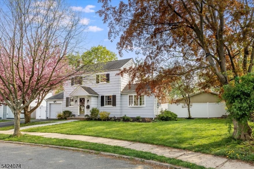 Move right into this beautifully maintained Colonial in the heart of Glen Ridge. Freshly painted and thoughtfully updated, this 3-bedroom, 2-bath home offers the ideal blend of classic charm and a perfect layout. The rooms connect naturally, with the flexibility today's buyers actually need.The main level features an updated kitchen, sun-filled living and dining spaces, and a versatile first-floor den with a full bath perfect for guests, a home office, or flexible living. Upstairs, three well-proportioned bedrooms are complemented by newer windows throughout, bringing in natural light at every turn. A finished basement with a dry bar, beverage fridge, and mini fridge adds valuable additional living space, ideal for entertaining or relaxing.Outside, a level, fully fenced yard is designed for easy enjoyment, complete with sprinkler system, outdoor furnishings, grill, mini fridge, and swing set. A newer front walkway and steps enhance curb appeal, while the location puts you on the jitney route to the Glen Ridge Midtown Direct train to NYC. Just moments from Carteret Park, Freeman Gardens, and Glen Ridge's top-rated schools, this home offers both convenience and lifestyle in one.