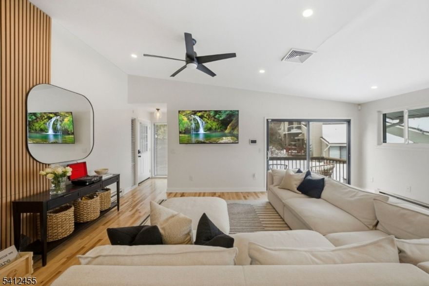 Welcome to 160 Overlook Drive, a stunning, modern condo in the heart of Clinton. Located on the second level, this beautifully maintained home offers privacy, easy access, and thoughtful upgrades throughout. Featuring two bedrooms and two full bathrooms, it combines a fresh, contemporary feel with elevated finishes. Natural light fills the open layout, highlighting gorgeous hardwood flooring throughout. The spacious living and dining area is perfect for entertaining or relaxing. Sliding glass doors open to a private balcony for morning coffee or evening relaxation. Fresh paint, upgraded light fixtures, and recessed lighting in the kitchen, living room, and primary bedroom add a modern, sophisticated touch. The kitchen is designed for function and style, with granite countertops, abundant cabinetry, generous prep space, and heated floors, a luxurious feature also found in both full bathrooms. Smart thermostats enhance convenience and efficiency. The primary suite serves as a serene retreat featuring plenty of closet space and a balcony to enjoy, while the second bedroom offers flexibility for guests, a home office, or additional living space.  A one-car garage provides parking and storage. Residents enjoy premium amenities including a pool, tennis courts, and a clubhouse, all near major routes, shopping, dining, and downtown Clinton. Move-in ready and effortlessly stunning, this condo defines modern luxury living.