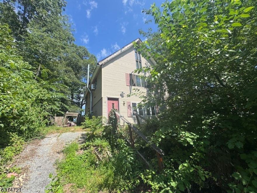 Chalet with Country Views and lake life. Welcome home to this custom built chalet, perfectly perched to capture sunrise to sunset vistas over rolling hills and optional Lake Neepaulin access. Skylight that showers the interior with natrual light. Cathedral ceilings, fireplace. Large Kitchen/Dining Room. Living Room with wood stove. Den and a flexible loft for a reading nook, play space or inspiring home office plus 2 Bedrooms and 2 bathrooms. Whether you crave a weekend retreat, this chalet delivers cozy character and modern ease in equal measure.