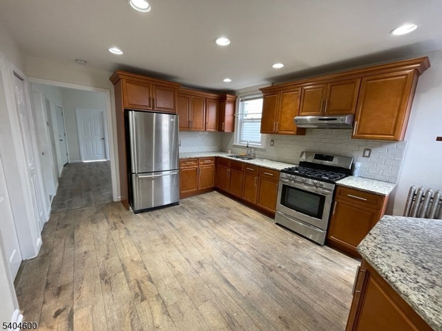 Beautifully Renovated 1st-Floor 3-Bedroom Apartment.  Welcome home to this freshly renovated 1st-floor apartment featuring three nicely sized bedrooms, perfect for comfortable living. Enjoy an updated kitchen with modern finishes and an upgraded bathroom designed for convenience and style. Ideally located near mass transit, major highways, restaurants, schools, and shopping, this unit offers exceptional accessibility and everyday convenience. A great option for anyone seeking a spacious, modern living space in a prime location!