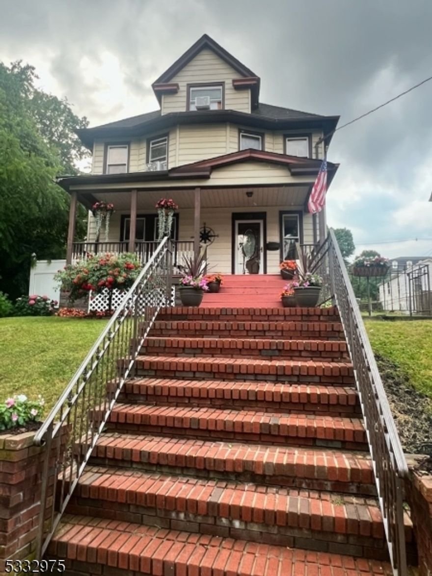 Welcome to this charming 4-bedroom, 1 bath Colonial located in a nice neighborhood in Dover. This cherished home offers spacious living throughout, perfect for both everyday comfort & entertaining. The inviting entryway leads to "Historic Grace" with its traditional wooden staircase & moldings, reminiscent of a bygone era. Featured in the large living room & formal dining rooms are the pocket doors & gas fire place as well as a wood burning stove, providing ideal space for hosting gatherings. The large eat in kitchen features ample cabinetry, counterspace & a butler's pantry adjacent to the kitchen that can be converted into an additional bathroom because the plumbing is set up already. Exit through the kitchen doorway that leads out to the wonderful backyard complete w/deck, patio, dog run & shed. The property runs to the end of the next street, which is Elliott Street. The second floor has four large bedrooms & main bath, (one bedroom is used as a den & the other is used as an office.) The finished attic can be a playroom, gym, office, entertainment room or just storage. There is a partially finished basement where you will find the laundry room, utility room & additional storage. This home includes Block 00512, Lot 00007, 50 x 75, taxes are $1,698.47. Possible driveway, above ground swimming pool, trampoline, there are endless possibilities. Must check with town regarding variance & permits.  All room dimensions are approximate.  Appliances are As Is.  Furnace 2022.