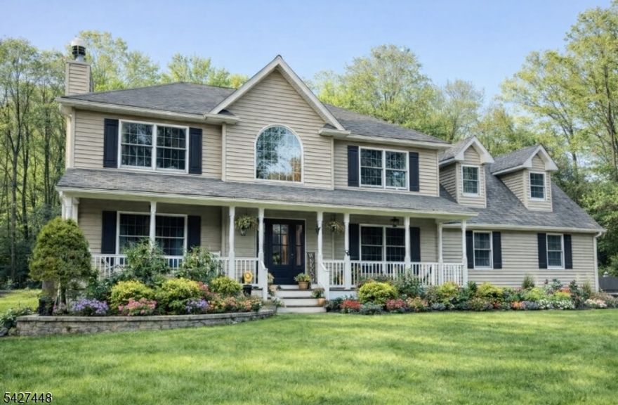 Privately set back from the road and surrounded by over 67 acres of Roxbury Township park land, this beautifully updated 4-bedroom (+den) home offers the perfect blend of privacy, comfort, and lifestyle. A welcoming front porch leads into a light-filled interior featuring an open layout, a dramatic two-story foyer, and a cozy living room fireplace. The home showcases a newly renovated kitchen, updated bathrooms, craftsman-style trim and doors throughout, new flooring, and fresh paint creating a truly move-in-ready space. The spacious primary suite includes a walk-in closet, while the flexible layout offers generous bedrooms, abundant storage, and a fully finished basement for work, recreation, or guests. Step outside to your private backyard oasis, complete with a relaxing deck and an in-ground pool with a new liner (2024). The poolside cabana, equipped with a bathroom, adds convenience and makes entertaining effortless. Within the private Lake Rogerene community (optional membership) and minutes from Lake Hopatcong, this home combines peaceful surroundings with easy access to boating, dining, and major commuting routes including Routes 80, 46, and 10 just one hour from NYC. A rare opportunity to enjoy privacy, nature, and lake-area living in Roxbury Township.