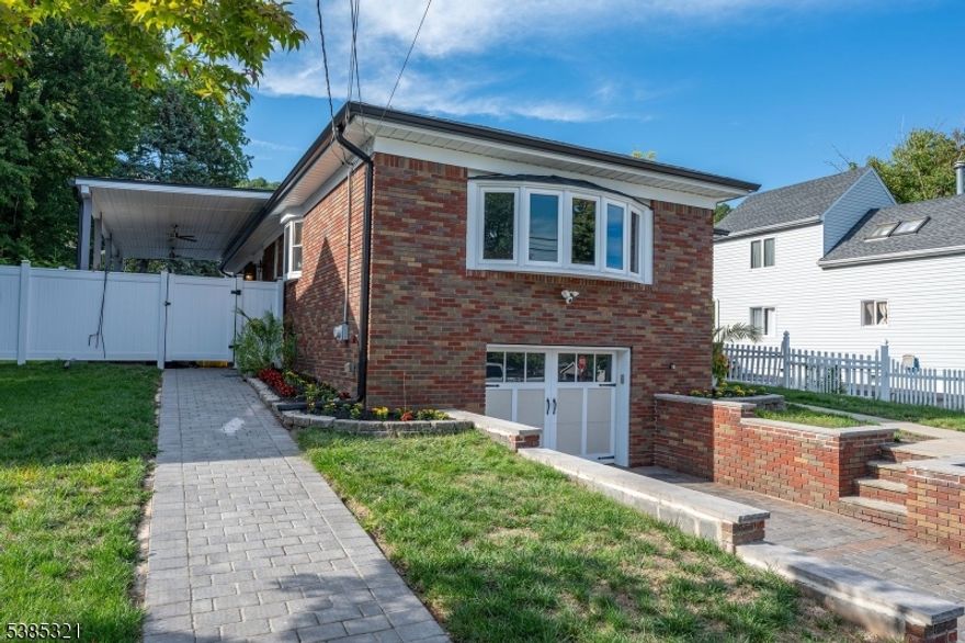 This beautifully renovated home has it all just move right in! Perfect for a true Mother/Daughter setup, the home has been completely updated within the last three years. Featuring 3/4 bedrooms, 3 full baths, and two custom kitchens, it offers comfort and versatility. Highlights include 2-zone baseboard heat, central air, an oversized garage, a new paver block driveway, and a new boiler and hot water heater. Inside, you'll find California custom closets, while outside is a true entertainer's dream: a 33' x 16' heated solar pool, a 30' covered outdoor kitchen with refrigerator, pizza oven, built-in grill, fire pit, and hi-hat lighting all set on paver block flooring. Additional upgrades include a new roof, gutters, leaders, and full interior/exterior French drains.