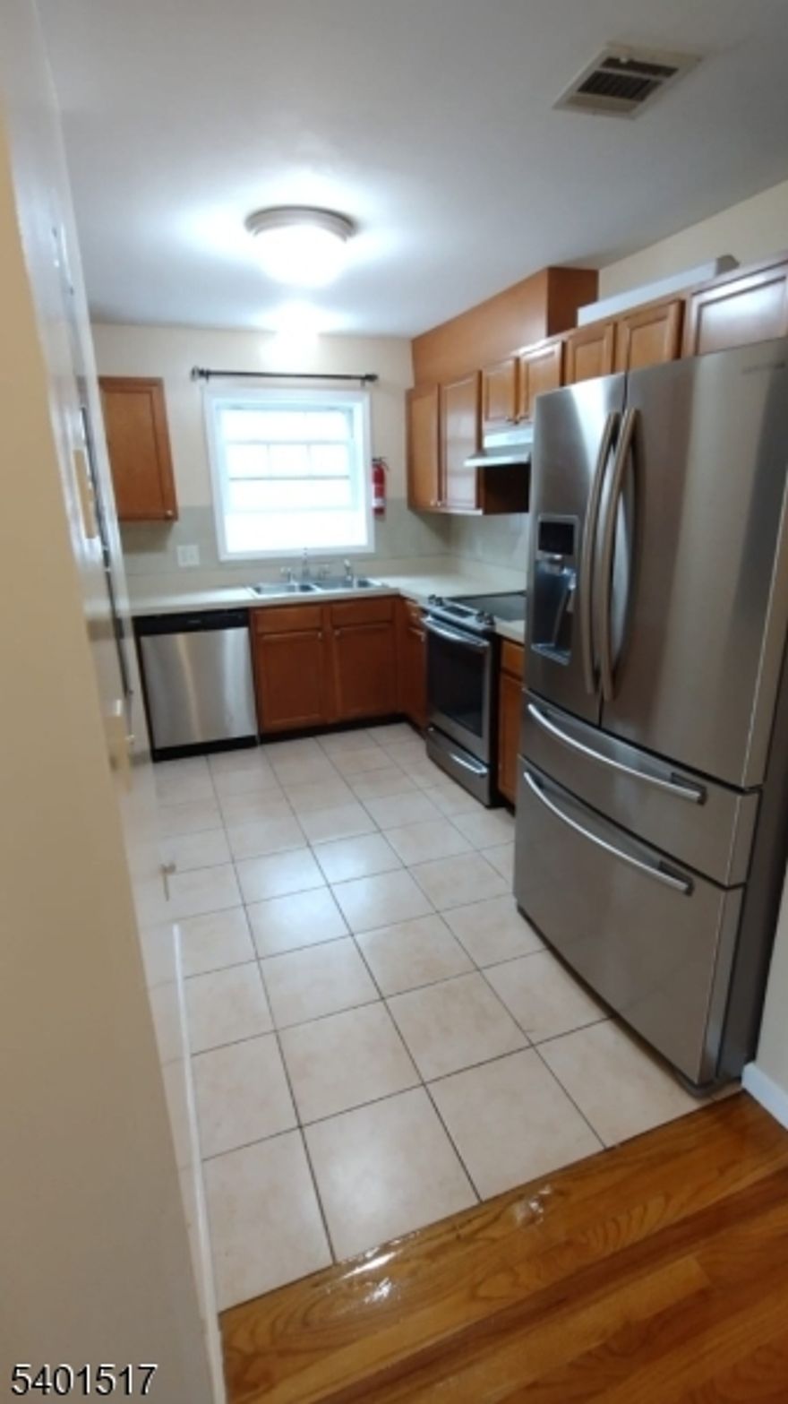Spacious 2nd floor apartment. Features living room, dining room, kitchen, 3 bedrooms and 2 full baths. Primary bedroom has it's own bath. Laundry in unit.