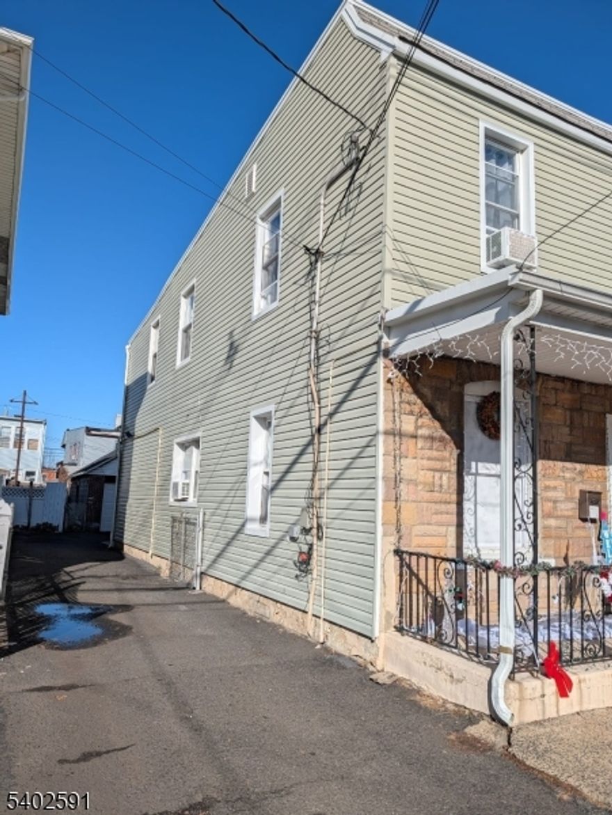 Spacious and beautifully maintained 3-bedroom apartment in desirable Elizabeth Port. Features include a bright living room, eat-in kitchen, 1 full bath, and hardwood floors throughout. Apartment is in excellent condition and includes 1 garage parking space. A must see!