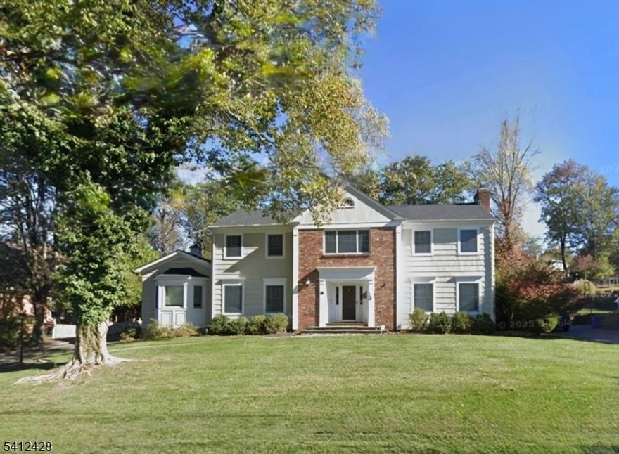 FAB SHORT HILLS COLONIAL * MODERN LIVING AT ITS FINEST * Nestled on a quiet street, set atop 0.51 acres in one of Short Hills most desirable neighborhoods, this home offers comfortable, luxurious living with an easy-flowing floor plan, high-end finishes and custom lighting, blending classic architecture with modern luxury. The welcoming foyer with side staircase, leads to elegant dining room and living with gas fireplace. Stunning gourmet kitchen boast wood cabinetry, granite counters, SS appliances and island with bar seating. Kitchen seamlessly adjoins family room and sunlit breakfast area with French doors to the outside perfect for both everyday living and entertaining. 1st flr bedroom or private office, butler's pantry, 1st floor laundry and mudroom add exceptional convenience. Upstairs, four spacious bedrooms and two renovated full baths, including a luxurious primary suite with lg walk-in closet and spa-like bath. The finished LL has it all: lrg rec rm w/ bar area, exercise rm, office, full bath & 2nd laundry area. Step outside to the landscaped property complete with a beautiful in-ground pool and plenty of room to relax or play. MORE: hardwood flrs, custom lighting, built-in speakers, security system, lawn sprinkler system, new roof, new water heater. A peaceful & private, move-in-ready home, yet only minutes to top-rated Millburn schools (Deerfield Elementary), niche boutiques & NYC trains. YOUR DREAM HOME in an unbelievable Short Hills location!