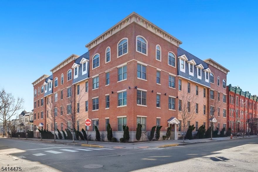 Perched on the top floor in the vibrant Jersey City Heights neighborhood, this sun-drenched duplex residence offers a perfect blend of space, light, and modern comfort. Oversized windows fill the home with natural light, creating an inviting and airy atmosphere throughout. The main level features an elegant open-concept living and dining area seamlessly connected to a stylish kitchen with a sleek quartz breakfast bar, ideal for entertaining or casual dining. Rich hardwood floors flow throughout the home, complemented by central HVAC with a Nest thermostat for effortless climate control. A full bathroom completes this level. The lower level offers two spacious bedrooms, a second full bathroom, and a convenient laundry and storage area, providing both comfort and practicality. Located just steps from Central Avenue and Journal Square, residents enjoy easy access to a dynamic mix of boutique shops, caf s, restaurants, and convenient transportation options to Manhattan. The building enhances the lifestyle experience with premium amenities, including a fully equipped fitness center and an impressive rooftop terrace showcasing breathtaking panoramic views of the New York City skyline. A rare opportunity to enjoy penthouse-style living, exceptional light, and an unbeatable Jersey City location. PROFESSIONAL PICTURES will be up next week.