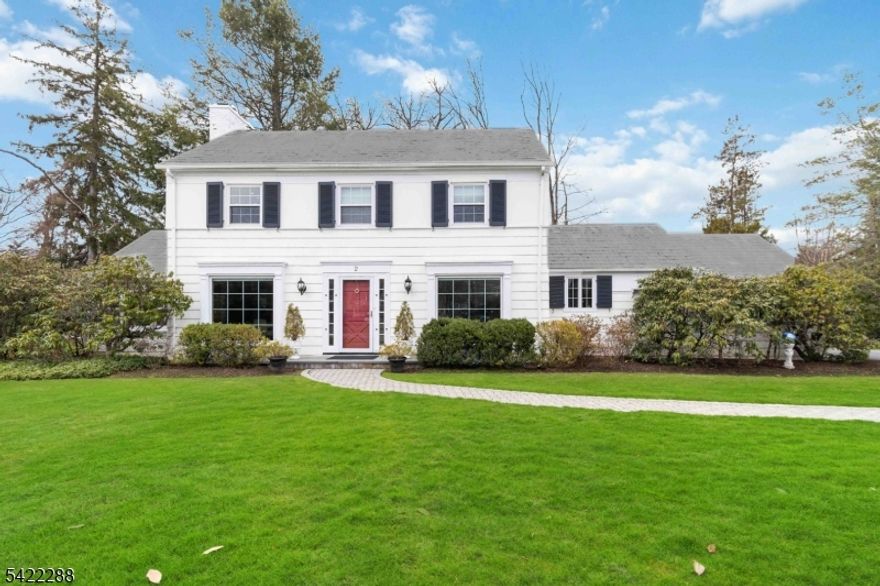 Classic Center Hall Colonial filled with charm, character, and natural light in one of Morris Township's most desirable Convent Station neighborhoods. A gracious entry foyer sets the tone, opening to sun-filled rooms with hardwood floors, classic millwork, and a comfortable, welcoming feel throughout. The living room features a fireplace with gas insert, easily converted back to wood-burning, while the formal dining room and wonderful sunroom with cathedral ceiling and all-day light offer inviting spaces for everyday living and entertaining. The modern kitchen features sleek cabinetry, stainless steel appliances by Bosch, Viking, and Sub-Zero, and opens conveniently to a mudroom off the garage. French doors, oversized windows, front and rear Dutch doors, and timeless architectural details add warmth and personality throughout. The flexible floor plan includes three spacious bedrooms and crisp white baths upstairs, plus a first-floor bedroom and full bath ideal for guests, one-floor living, or a private home office. The lower level offers a sizable rec room perfect for a gym, playroom, office, or media space. A slate roof, charming curb appeal, expansion possibilities, and a lovely yard with mature trees, privacy hedges, open lawn, and patio seating off the sunroom further enhance the property. Just a quick jaunt to downtown Morristown, Madison, and Convent Station, this is a rare opportunity to own a truly distinctive and special home.