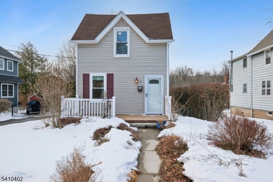 Bright, open, and effortlessly charming, this beautifully updated Colonial in the highly sought-after Rock Spring neighborhood offers an inviting layout & abundant natural light. Freshly painted with newly refinished hardwood floors and recessed lighting throughout, the home is airy and move-in ready. Updated kitchen with granite countertops & stainless steel appliances. Renovated baths provide a fresh, modern feel. With 2 bedrooms, 1.5 baths, a bright living room, & dedicated dining area, the home has defined yet connected spaces. A separate laundry room and smart floorplan make daily life feel easy and organized. Owned solar panels add meaningful energy savings and long-term value. Enjoy a welcoming front porch, the perfect spot for morning coffee, evening unwinding, or connecting with neighbors on this quiet street. A perfect condo alternative with generous outdoor space, central air, two-car garage, new roof, a gas generator, & Trex-style low-maintenance front decking & rear stairs - rare conveniences at this price point. Outside, established perennial gardens bloom throughout the front, side, & rear yards. Room to relax, entertain, or play in the generously sized backyard. Close to the Oak Ave path with direct access to South Mountain Reservation, Rock Spring Golf Club, Turtle Back Zoo, Codey Arena, parks, restaurants, shopping, & the Midtown-Direct Jitney to NYC. An exceptional value in one of the area's most desirable neighborhoods.