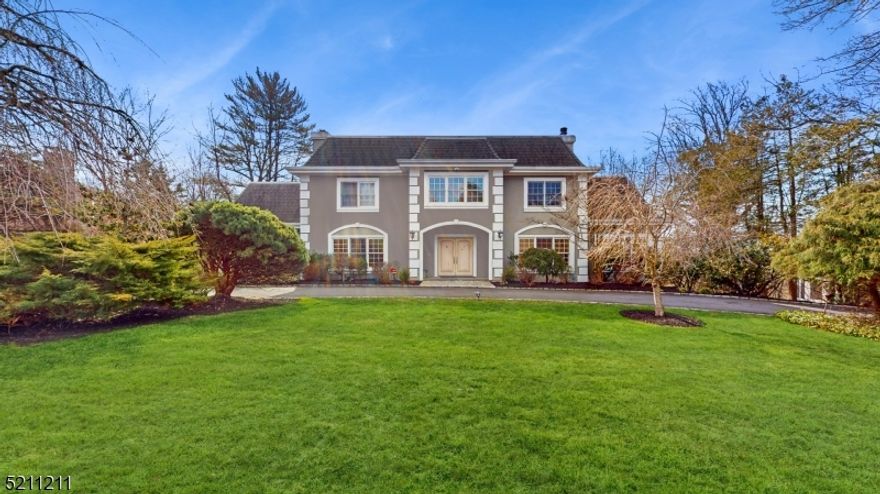 It's a stylish and welcoming home located in the coveted neighborhood of Short Hills. Entering the main floor, a high ceiling entry foyer with stunning Chandelier and staircases, formal living room with double-side fire place and wet bar; formal dining room with fire place; two powder rooms; family room/Library with beautiful wood shelf; masterful culinary kitchen with a breakfast area, command center, double sinks, high-end SS appliances(subzero fridge, Viking range, Bosch dishwasher, wine cooler, Deco double oven), granite counter top, crisp white cabinet; butler pantry; laundry room. The second level of living space includes master suite with two WIC, two full bath, siting area, large balcony facing the old short hills garden and green wood garden, enjoy the picturesque view everyday. Three additional spacious bedrooms, one en suite with full bath, the other two sharing a jack-and-jill bath and each have it's own WIC. The lower lever delivers a sprawling rec room, exercise room, one more bedroom, one full bath, utility room, storage room, and 3-car garage entrance, sliding door easy to walk out to the backyard. Generator for the whole house to ensure the fun never end. Entertaining and fulfill your life style, this is it! (the square footage is approximate, and includes the finished lower level.)