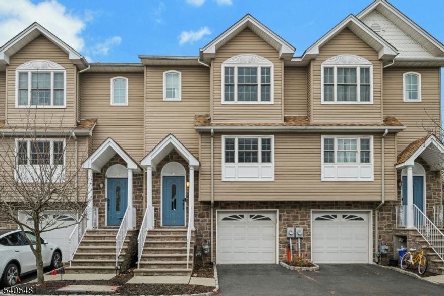 Luxury Bloomfield Townhouse with Garage, EV Charger and Flexible Living Space!Welcome to this beautifully maintained 2 bedroom, 2.5 bath townhouse with a bonus lower-level den or home office, located in one of Bloomfield's most convenient commuter locations.This spacious multi-level home offers the feel of a single-family residence with the convenience of townhouse living. The bright and open main level features a modern kitchen, generous living and dining space, and abundant natural light. Upstairs you will find two large bedrooms, each with ample closet space, including a primary suite with private bath.The lower level provides a flexible bonus room that can be used as a home office, den, gym, or guest space, perfect for today's work-from-home lifestyle.What truly sets this home apart is the private garage plus driveway parking and a dedicated EV charger, ideal for electric vehicle owners and commuters.Quiet residential setting with easy access to NYC transportation, less than a mile from the Bloomfield train station, with a jitney stop just outside the community, providing an easy commute to Midtown Manhattan . Close to shopping, parks, and dining.This is a rare opportunity to rent a townhouse that offers space, privacy, and premium features usually found only in single-family homes.