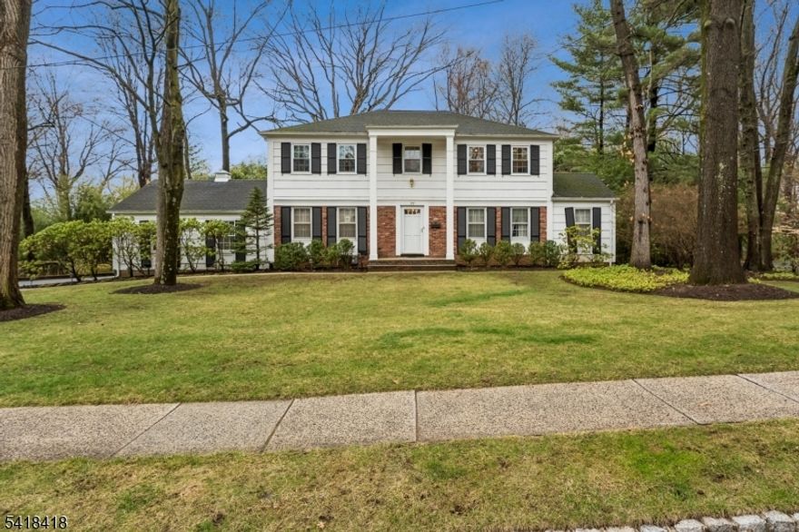 Welcome to this 4 bed, 2.5 bath home in the sought after Murray Hill section of New Providence. This beautiful home is perfect for modern living and entertaining. The first floor features a spacious foyer which flows into the elegant living room on one side and a formal dining room on the other. The spacious sun-filled eat in kitchen leads to an open sitting area for relaxation. There are sliding doors to the deck with swing seat and awning to enjoy the warm summer days/nights. Perfect area for entertaining and chilling. The large deck overlooks a wooded backyard for extra privacy. The kitchen leads to the laundry room with access to the 2 car attached garage. The spacious family room has a gas fireplace, perfect for those wintery nights. The second level features 4 generously sized bedrooms, the main bathroom and the primary en suit bath. The finished basement offer ample space and is perfect for a recreation area, home office or a gym. This highly desirable location is in walking distance to the Train Station at Murray Hill which is direct to NYC. It is also conveniently located to New Providence vibrant downtown and award winning schools. This house has a full house generator. It is a must see!