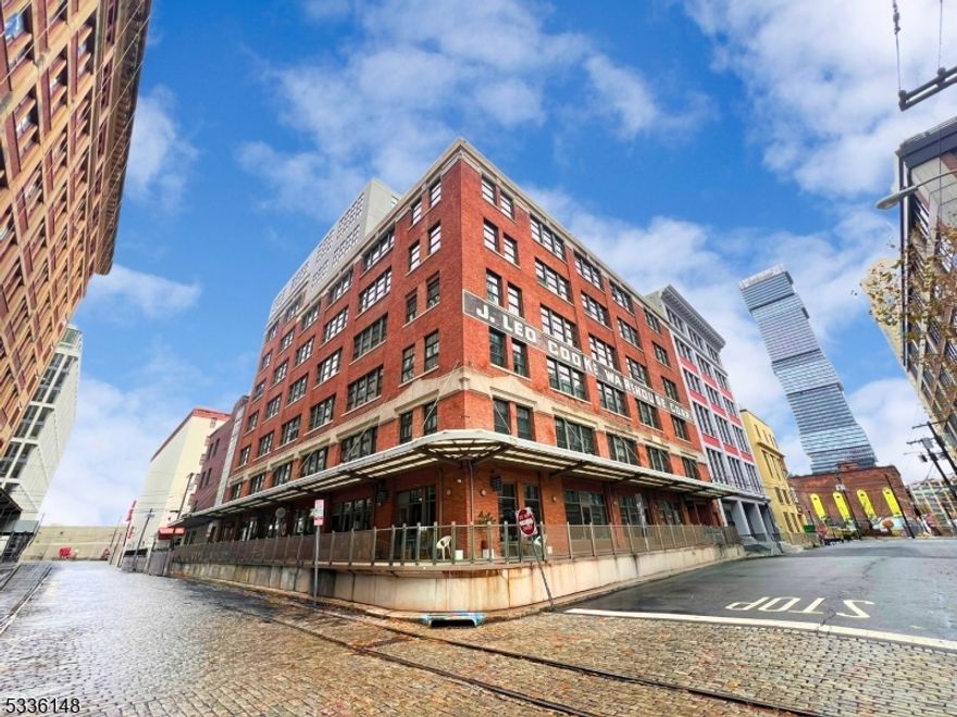 This Studio Loft with bedroom/office is for sale as a work/live affordable housing unit. Artist must be approved by the Jersey City Planning Board.  Available for owner occupants only.  Located in the vibrant Powerhouse Arts District of Downtown Jersey City, this beauty boasts high ceilings, concrete flooring, central air, and an open-concept layout. This is a blank canvas for your creative vision. With large South-facing windows, natural light floods the space, and highlighting its raw industrial charm. This beauty is in need of renovations, making it a perfect opportunity to customize your dream loft. Enjoy the convenience of a package room and a shared rooftop deck with breathtaking views. Ideally situated near shopping, dining, top-rated schools, and multiple transit options, your travel options are unlimited. The waterfront is a stroll away, offering scenic walks and stunning skyline views. Don't miss this rare chance to create your ideal urban retreat in one of Jersey City's most dynamic neighborhoods! Schedule a viewing today.