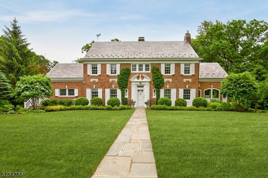 With a commanding presence on one of Summit's prime streets, this home makes a lasting impression. An outstanding, five-bedroom brick Georgian Colonial, featuring beautiful architectural details throughout its flowing floor plan accented with a designer's touch, this home has been updated with state-of-the-art systems and enhancements for today's discerning homebuyer.  Exceptional design, prime neighborhood location and suburban living at its best make this fine Summit residence truly "One of those Homes"!   Many updates including: New Kitchen, New Powder Room, Savant home automation, SMS wireless security system, Wired wifi network, 20,000 kw Generac generator, New exterior landscaping & exterior accent lighting, an much more...