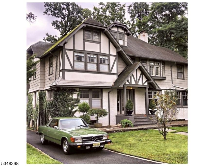 Located in historic Seven Oaks in Orange, this elegant 5 bedroom, 3.5 bathroom home blends classic charm with modern amenities. Inside, you'll find spacious living areas, a dedicated art studio, and a private office, in a finished lower level with a custom wine cellar. The primary suite features an ensuite (needs updating) and generous bedroom spaces.The backyard is a standout, perfect for entertaining or relaxing in a beautifully landscaped setting. A two-car garage completes this exceptional property, offering both function and sophistication. Welcome to your new home!