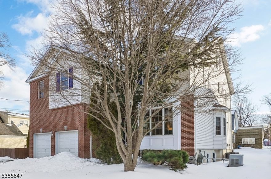 Experience the perfect blend of modern design & functionality in this stunning 6-bedroom, 4-full bath home, located in Maplewood's Tuscan neighborhood.  Designed for today's lifestyle, the sun-filled eat-in kitchen flows seamlessly into a spacious breakfast area with sliders to the deck and an impressive great room with soaring cathedral ceilings and GFP, creating an open, airy atmosphere for both entertaining & daily living.  A first-floor bedroom adjacent to a full bath provides an ideal setup for guests or office.  Additionally, the first floor offers a formal Dining Room, a Living Room and a double-height entry foyer.The second floor offers 4 full bedrooms and 2 full baths--including the luxurious primary suite, with its tray ceiling, walk-in closet, spa-inspired bath featuring a soaking tub, separate shower, private water closet, and two vanities--and sitting area. Additionally, the finished basement features a guest room, full bath, large recreation area including a media sitting space and a dedicated play zone ready for billiards, ping pong storage and walkout stairs to the backyard. The exterior's timeless brick & vinyl siding complements the home's clean architectural lines, while inside, thoughtful details elevate every space, while the garage allows easy access to and from the home. This home delivers space, style, and convenience in one exceptional offering just 6/10's of a mile from everything Maplewood has to offer great restaurants, shops, plus NYC trains.
