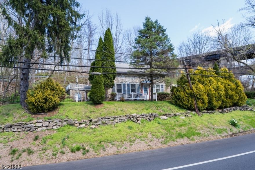 Unique opportunity to own a true piece of history in Phillipsburg, NJ! This remarkable 200+ year-old stone schoolhouse has been thoughtfully converted into a one-of-a-kind residence, blending timeless character with modern convenience. Rich in historic charm, the home features deep windowsills, exposed wood beams, and random-width wide plank flooring throughout. A stunning ?revolutionary? fireplace mantel serves as a focal point, complemented by a Vermont Castings wood stove that adds warmth and ambiance.The property offers creative and functional touches including pocket storage and a convenient second-floor laundry. Two separate driveways, one on each side of the home, provide added flexibility. Outside, enjoy long road frontage and a peaceful setting with plenty of space to relax and unwind. The property also includes three storage sheds, two on concrete foundations, plus unique historic outbuildings including a smokehouse and rare lime kiln. A rooftop patio atop the former smokehouse creates a truly special outdoor retreat.Whether you?re seeking a full-time residence, weekend getaway, or a unique Airbnb opportunity, this property offers endless potential. Ideally located near schools, shopping, and outdoor recreation, with easy access to I-78 and Route 22. A rare chance to own a home with unmatched character and history. Schedule your private showing today!