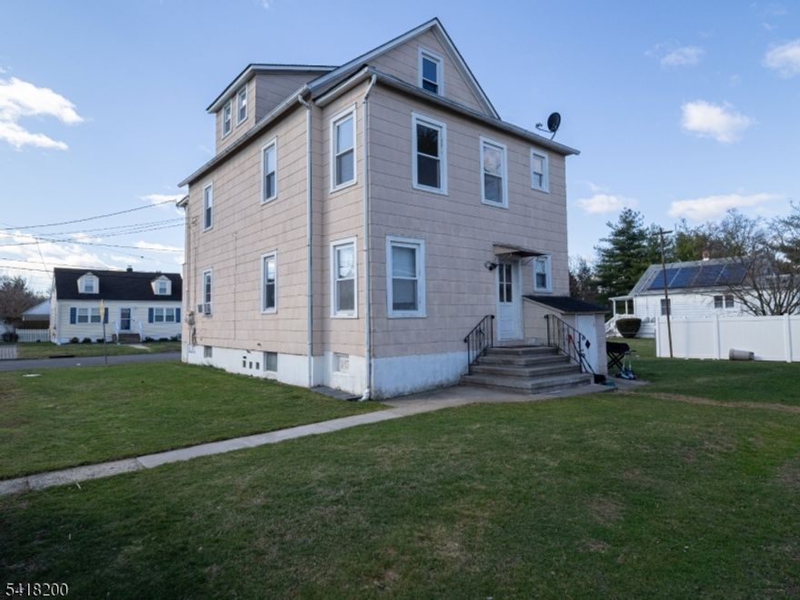 Amazing investment opportunity! This two-family home sits on a desirable corner lot and offers excellent income potential. The upstairs unit is fully renovated and features two bedrooms, a den, and access to a spacious attic with great potential for future finishing. The first-floor unit includes two bedrooms, a kitchen, living room, and full bath. A shared basement provides convenient laundry facilities for both units. Ample of space in Detached Large 2 Car Garage. Ideal for an owner-occupant or investor, this property offers a strong rental setup and long-term value. Don't miss this opportunity!