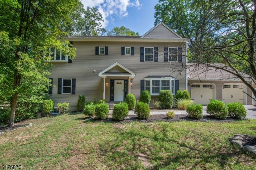 Built in 2006!! This Spectacular & Beautifully Appointed 4 BDRM Center Hall Colonial is nestled on a dead end in desirable Cedar Lake. Flowing, classic layout great for entertaining. Formal living room. Updated kitchen w/granite counters, stainless steel appliances, center island & gas cooking which opens to the sun-filled dining room - could be used as eating area/living area (Please look at pictures from previous listing to see the set up). Perfect space to host all your events! Sliders walk out to the trex deck & fenced in yard. Convenient powder room. Gorgeous HW flooring & neutral colors throughout. High ceilings & high hat lighting. Upstairs 4 large bedrooms including a master which boasts 2 closets & an en-suite. Walkout BSMT - bonus living & storage. Large garage provides even more storage. Newer washer, dryer & boiler. Situated in a private location with easy access to all life's conveniences! Short walk to Cedar Lake Clubhouse & beach! Just minutes to public transportation -NYC-Direct train & bus, major highways, grocery store & great restaurants/shopping in Downtown Denville.