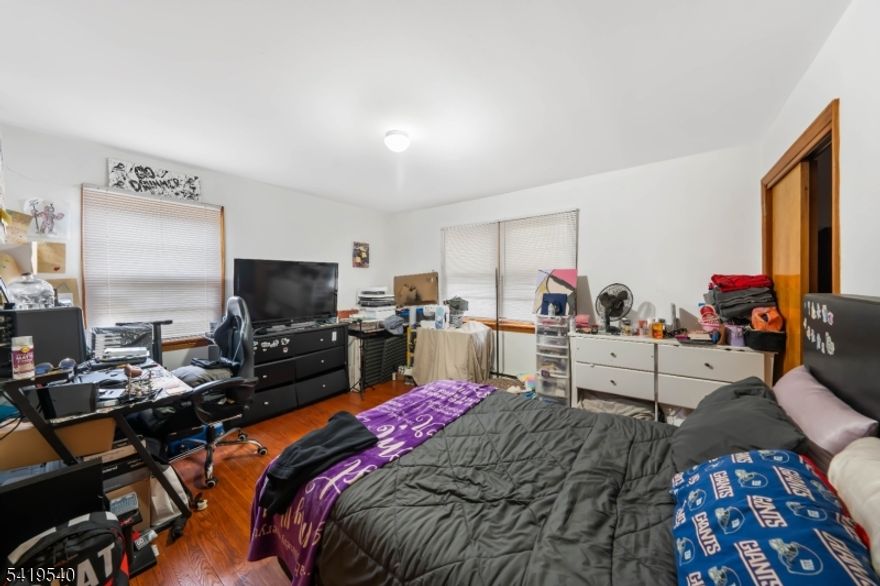 Spacious and well-maintained two-family home offering 3 bedrooms over 3 bedrooms perfect for investors or owner-occupants! Each unit features generous living space, bright rooms, and a functional layout. The finished basement adds valuable bonus space, ideal for recreation, home office, or additional storage. Enjoy the convenience of a detached 2-car garage and ample off-street parking. Located in a desirable neighborhood close to major highways, shopping, and public transportation.