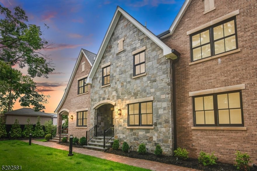 HURRY! ONLY ONE UNIT LEFT! Extraordinary Townhouses with 3 bedrooms, 3 full baths & 1 half bath built by Summit's premier builder, Mountainview Developments! This unit has an elevator! Ideally located just a few blocks to downtown Summit - high ceilings, high end finishes with white oak hardwood floors throughout. Great room features gas fireplace & access to deck & is totally open to stunning gourmet kitchen with custom white cabinetry, quartz countertops, under cabinet lighting, & top of the line appliances. Luxurious Primary Suite & spa-like Primary Bath with soaking tub & shower stall plus 2 more bedrooms & laundry on 2nd floor. Media room in lower level with full bath with attached 2-car garage. Gorgeous townhouses in the absolutely ideal location in Summit. Has Elevator!